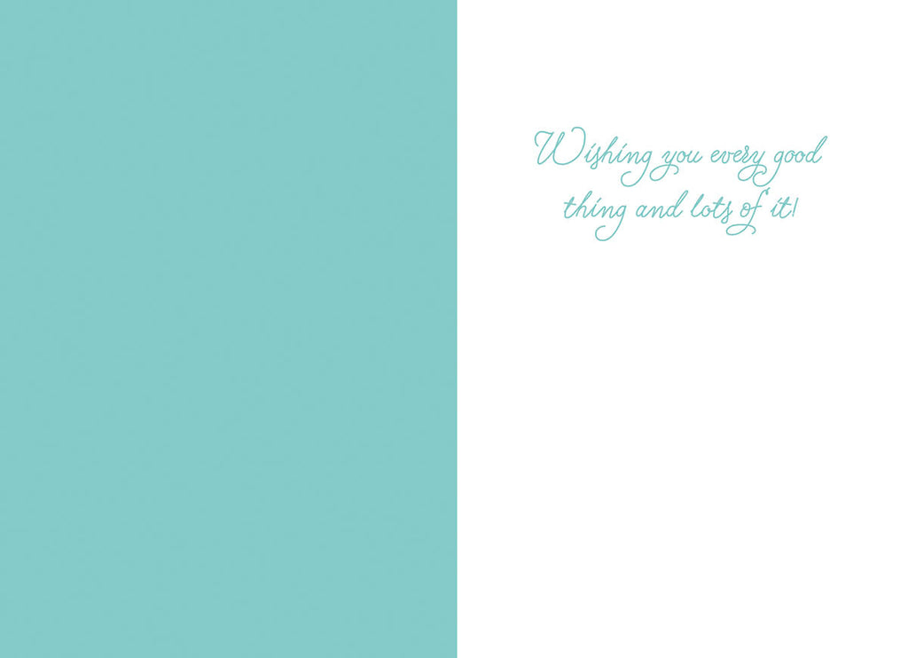 Inside of a pastel blue and white Easter card, featuring a heartfelt message 'Wishing you every good thing and lots of it!' in elegant script.