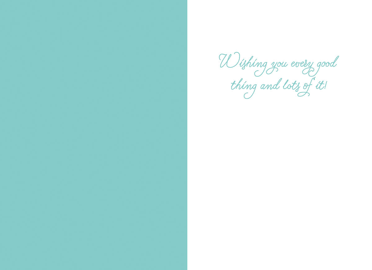 Inside of a pastel blue and white Easter card, featuring a heartfelt message 'Wishing you every good thing and lots of it!' in elegant script.