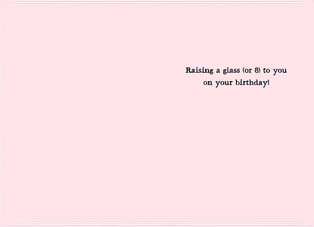 Inside view of a funny birthday greeting card for a friend, with pink background and text: 'Raising a glass (or 8) to you on your birthday!'