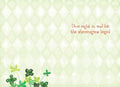 Light green quilted background greeting card with whimsical shamrocks and clovers in various green patterns along the bottom. Features text 'Dive right in and let the shenanigans begin!' in a playful orange-red font, perfect for celebrating St. Patrick's Day with friends and family.