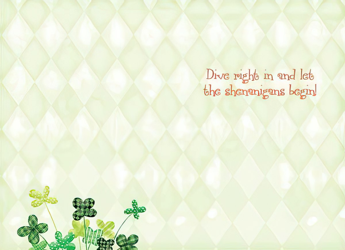 Light green quilted background greeting card with whimsical shamrocks and clovers in various green patterns along the bottom. Features text 'Dive right in and let the shenanigans begin!' in a playful orange-red font, perfect for celebrating St. Patrick's Day with friends and family.