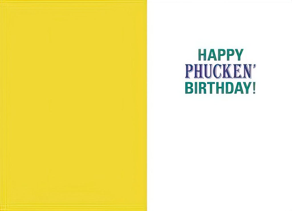 Inside view of a funny birthday card revealing the message 'HAPPY PHUCKEN' BIRTHDAY!' in green and blue text, suitable for a lighthearted recipient.