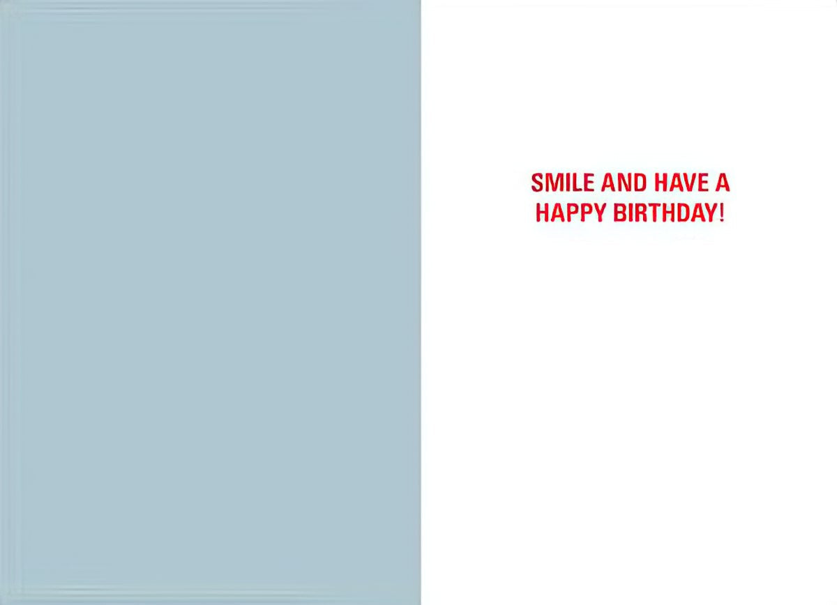 Inside of humorous greeting card with light blue left panel and white right panel featuring red text 'Smile and Have a Happy Birthday!'