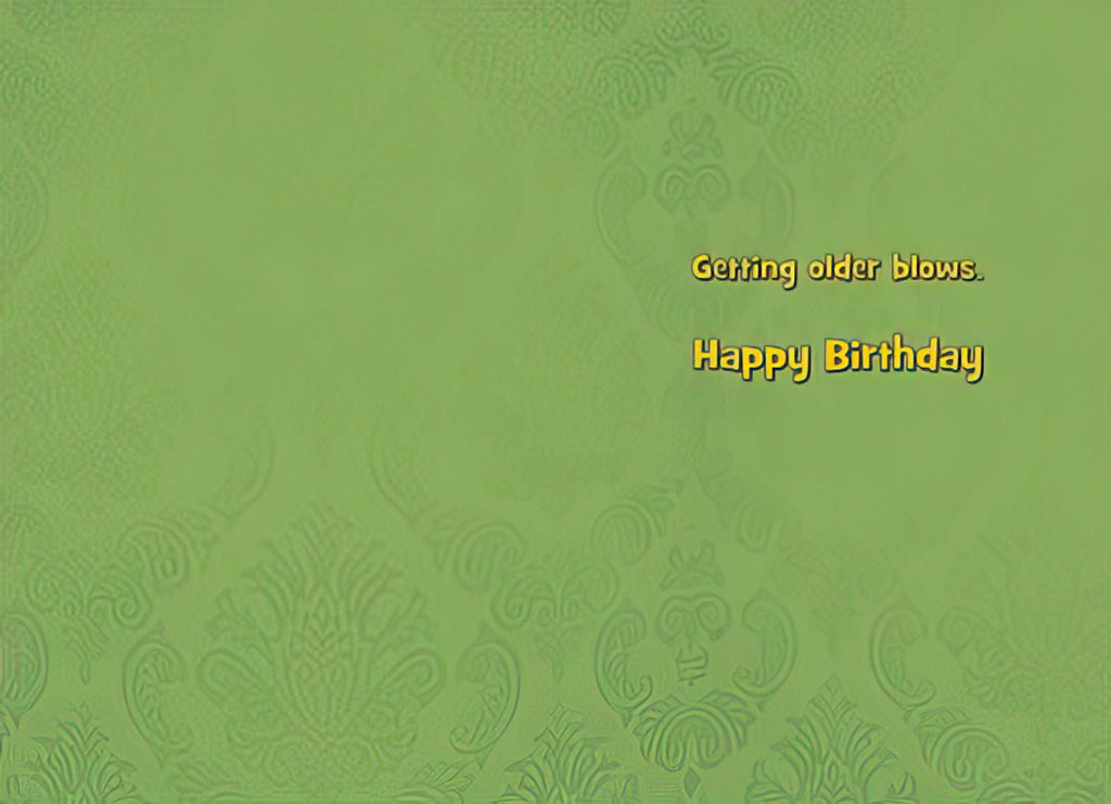 Inside of a funny greeting card with a simple green background and the printed text 'Getting older blows. Happy Birthday.'