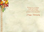 Inside of a heartfelt Thanksgiving greeting card with warm message 'Wishing you everything bright and beautiful... Happy Thanksgiving' and corner autumn foliage design.
