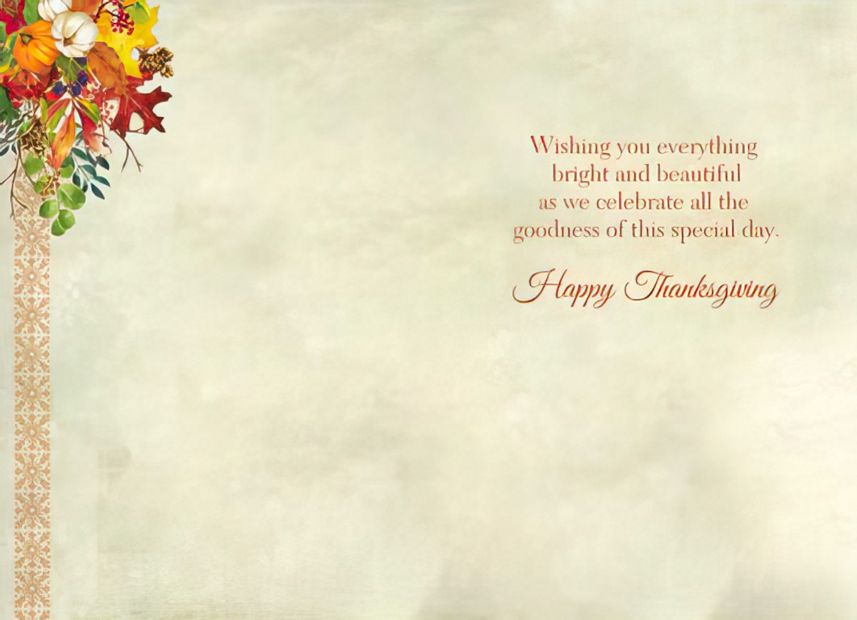 Inside of a heartfelt Thanksgiving greeting card with warm message 'Wishing you everything bright and beautiful... Happy Thanksgiving' and corner autumn foliage design.