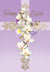 an ornate golden cross decorated with white flowers