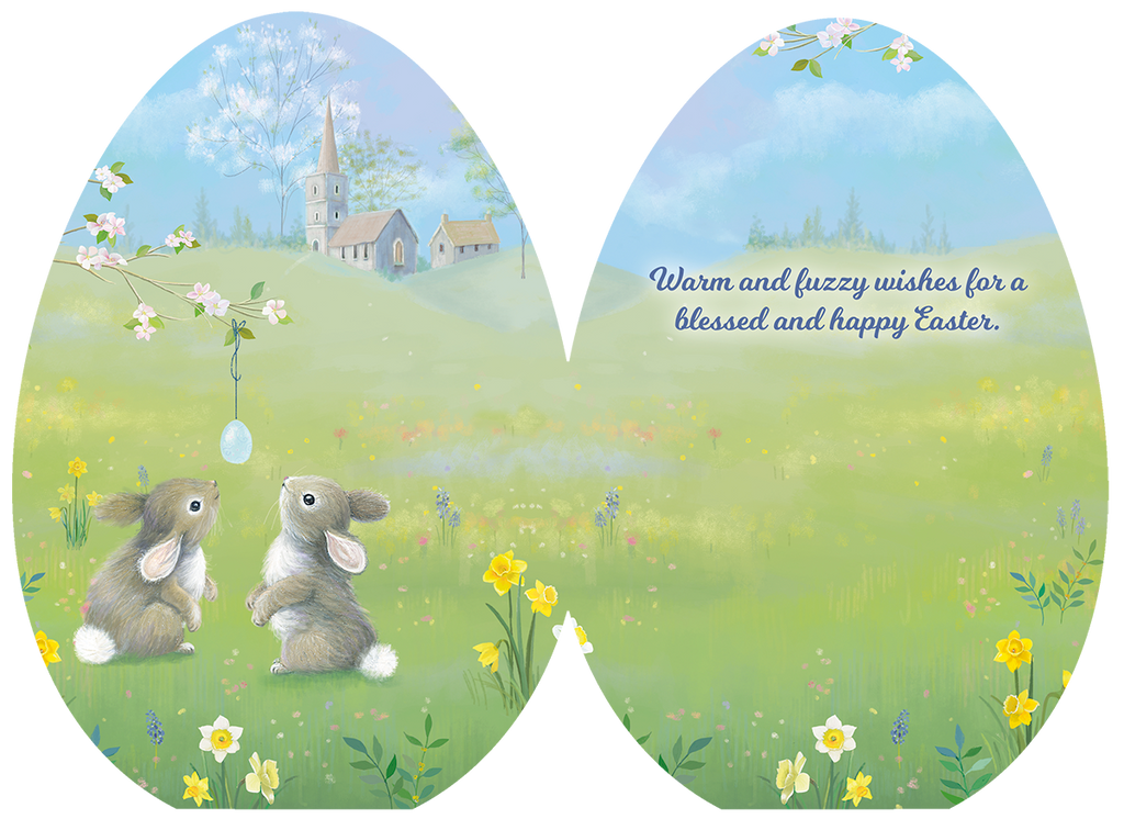 Open Easter greeting card revealing the sweet message 'Warm and fuzzy wishes for a blessed and happy Easter.' alongside the charming illustration of two bunnies in a spring meadow with a church and hanging egg design.