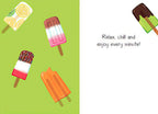 Inside of a greeting card with a light green background on the left, several scattered popsicles, and text on the right 'Relax, chill and enjoy every minute!'.