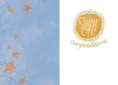 Inside of a graduation card with a blue border featuring golden stars, and a white side with 'Shine On!' and 'Congratulations' text.