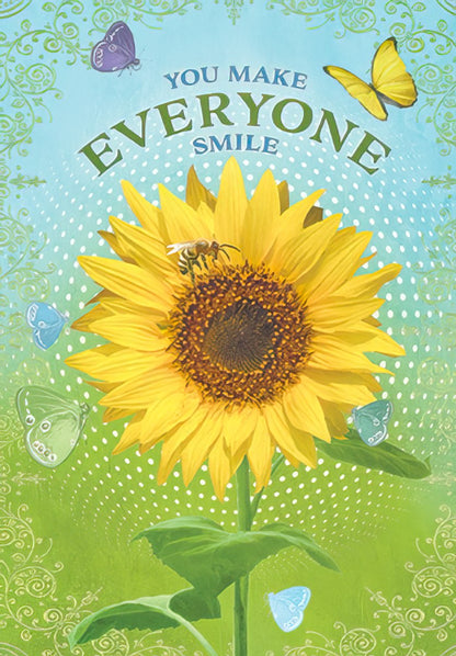 Front of 'You Make Everyone Smile' card with a large sunflower, bee, and butterflies, vibrant green and blue background.