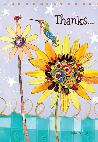 Rustic bucket filled with vibrant sunflowers, purple dahlias, and baby's breath, on a wooden surface.