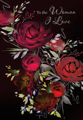 Front of a romantic greeting card featuring a lush bouquet of deep red watercolor roses and green foliage on a dark background, with elegant white script text 'To the Woman I Love'.