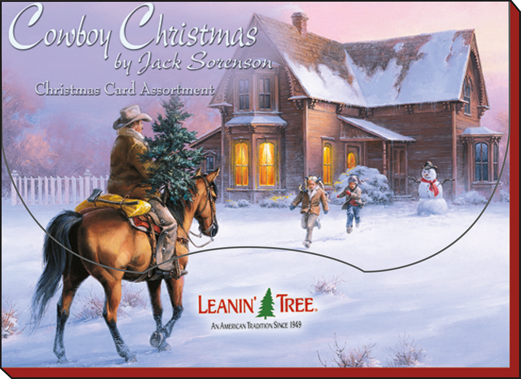 Western holiday greeting card box featuring a cowboy on horseback carrying a pine tree, children playing in snow, a snowman, and a rustic house, titled 'Cowboy Christmas by Jack Sorenson'.