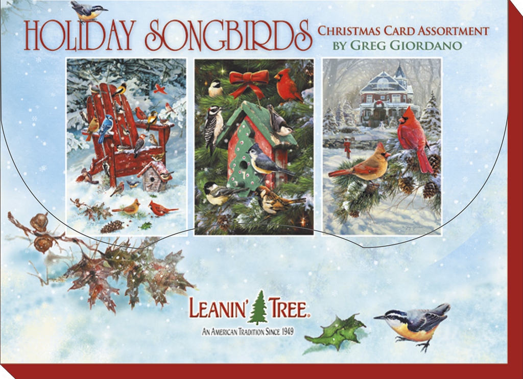 Product packaging for 'Holiday Songbirds Christmas Card Assortment by Greg Giordano' from Leanin' Tree. The box displays three card designs: birds on a red Adirondack chair, birds around a green birdhouse, and cardinals in front of a snowy house, set against a background of falling snow.
