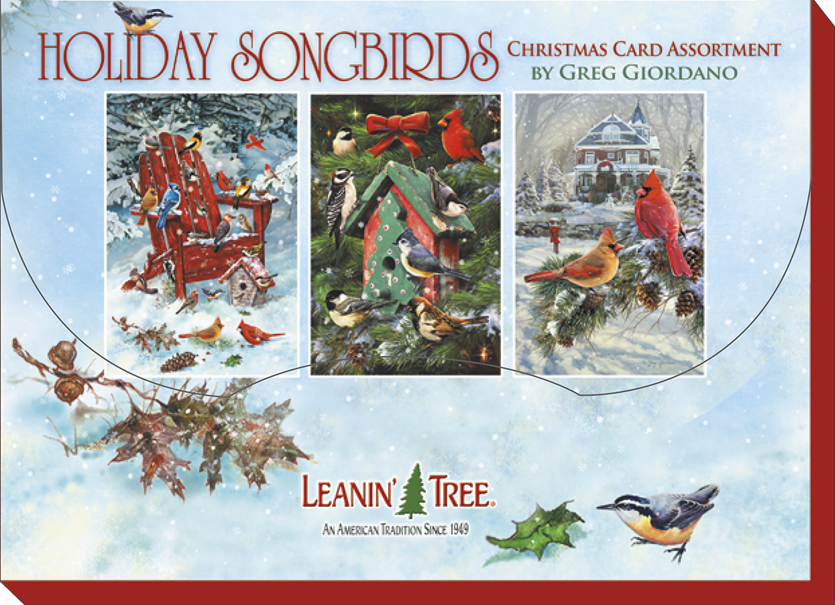 Product packaging for 'Holiday Songbirds Christmas Card Assortment by Greg Giordano' from Leanin' Tree. The box displays three card designs: birds on a red Adirondack chair, birds around a green birdhouse, and cardinals in front of a snowy house, set against a background of falling snow.