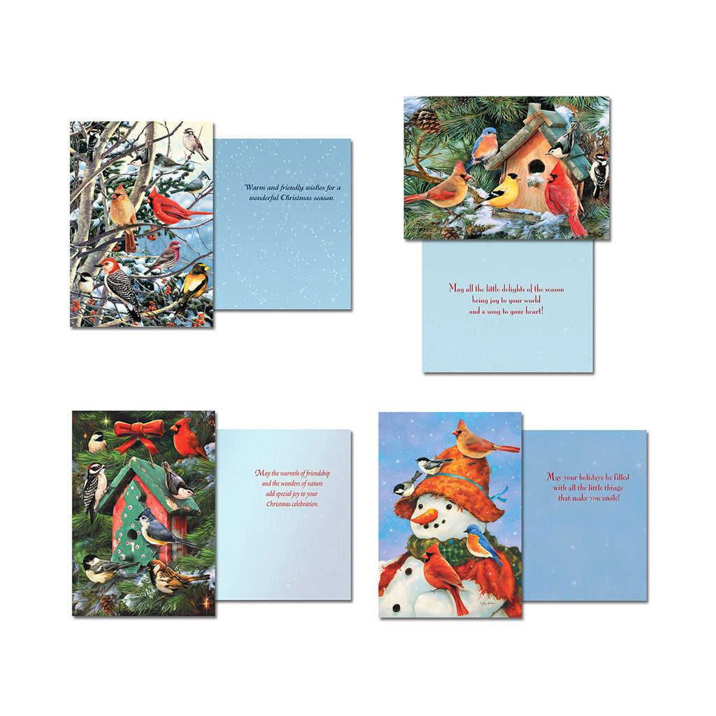 Four different open greeting cards from the assortment. Designs include: birds on snowy branches ('Warm and friendly wishes'), birds around a feeder ('May all the little delights bring joy'), birds on a snowman ('May your holidays be filled with all the little things that make you smile'), and birds at a birdhouse ('May the warmth of friendship and the wonders of nature add special joy').