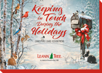 Leanin' Tree holiday card assortment showcasing 'Keeping in Touch During the Holidays' with a rustic mailbox, birds, and rabbits in a snowy forest, perfect for seasonal greetings.