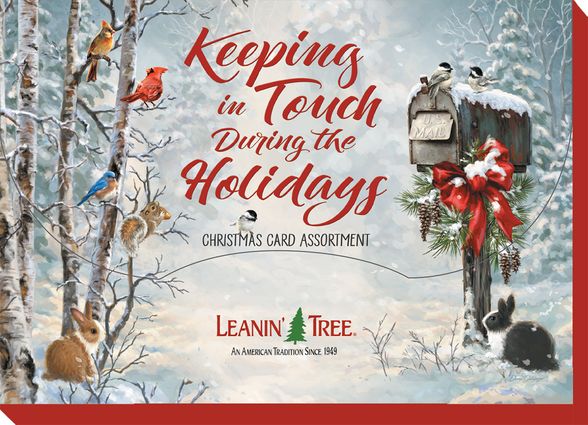Leanin' Tree holiday card assortment showcasing 'Keeping in Touch During the Holidays' with a rustic mailbox, birds, and rabbits in a snowy forest, perfect for seasonal greetings.