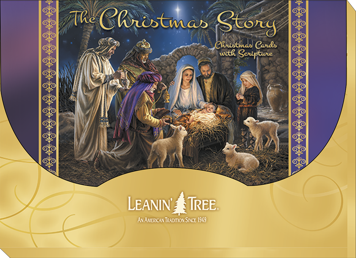 Boxed set of Leanin' Tree 'The Christmas Story' greeting cards, featuring a detailed nativity scene with Mary, Joseph, baby Jesus, shepherds, and lambs, against a golden and purple backdrop.