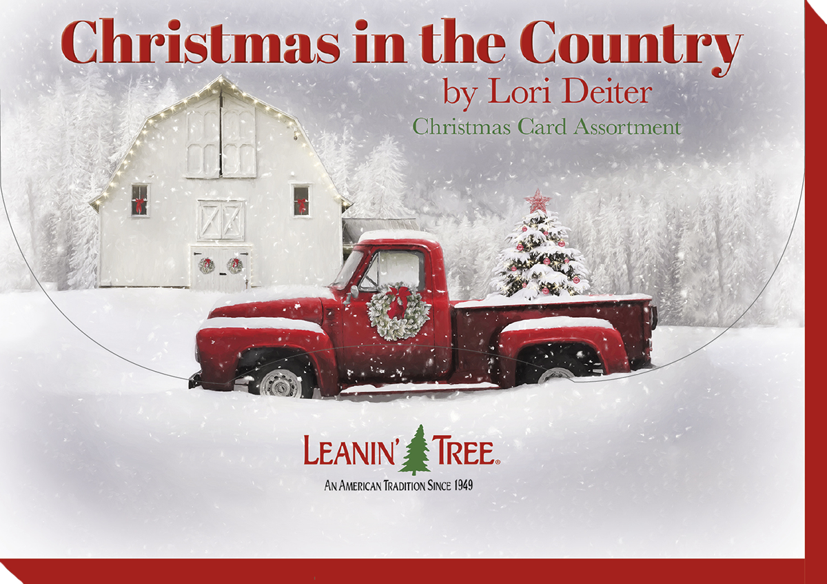 Close-up of 'Christmas in the Country' card assortment box cover, featuring a red vintage truck with a Christmas tree in front of a snow-covered white barn.