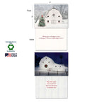 Front and inside views of two different country Christmas cards, one depicting a white barn with a Christmas tree in snow, and another with an illuminated white barn and windmill at night; highlights sustainably-sourced paper and soy-based inks.