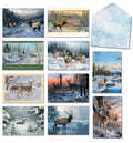 Assortment of nature-themed holiday greeting cards featuring deer and elk in snowy winter landscapes, with a decorative blue snowflake envelope.