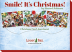 Product cover for 'Smile! It's Christmas! by Howard Robinson Christmas Card Assortment' showing three sample cards with happy animals in Santa hats, and the Leanin' Tree logo.