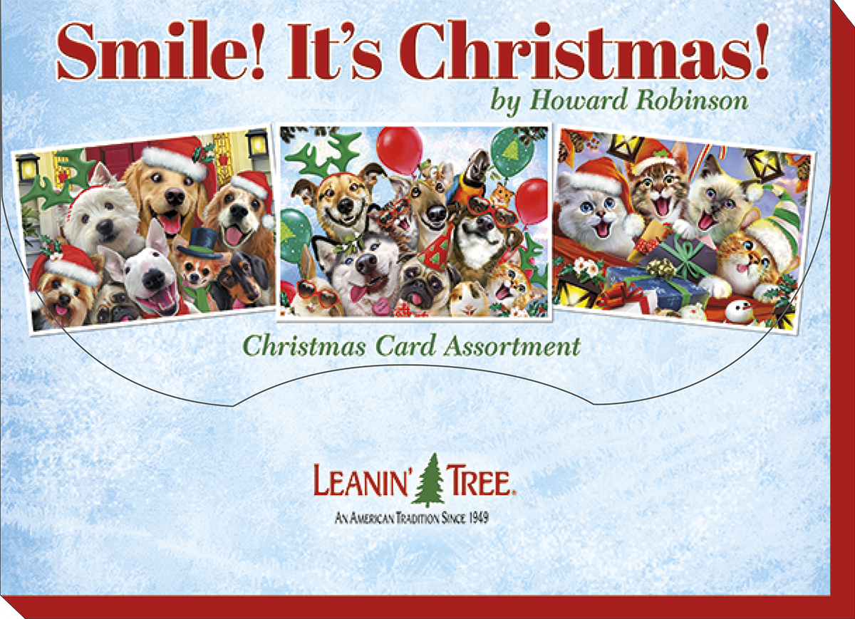 Product cover for 'Smile! It's Christmas! by Howard Robinson Christmas Card Assortment' showing three sample cards with happy animals in Santa hats, and the Leanin' Tree logo.