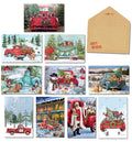 Assortment of festive holiday greeting cards featuring vintage red and teal trucks laden with adorable puppies, gifts, and evergreen trees in snowy winter scenes, with a blank kraft envelope.