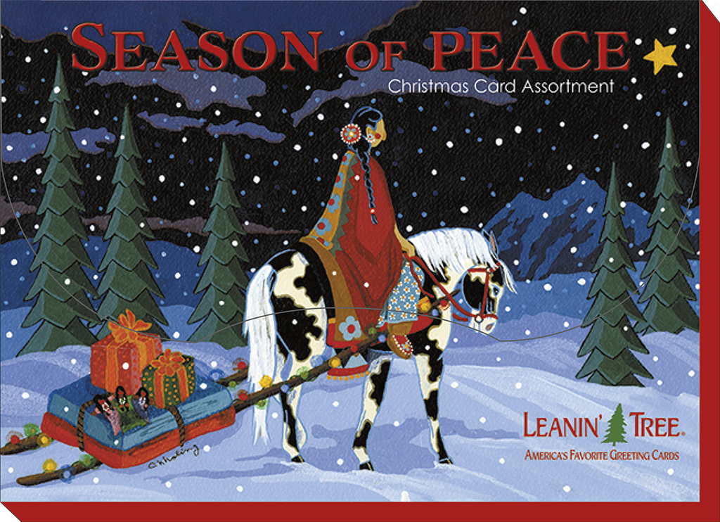 Front of a boxed 'Season of Peace' Christmas card assortment showing a person on a horse pulling a gift-filled sleigh through a snowy winter landscape.