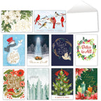 Assortment of 10 festive Leanin' Tree holiday greeting cards featuring winter scenes, cardinals, poinsettias, snowmen, and religious peace messages, with white envelopes.