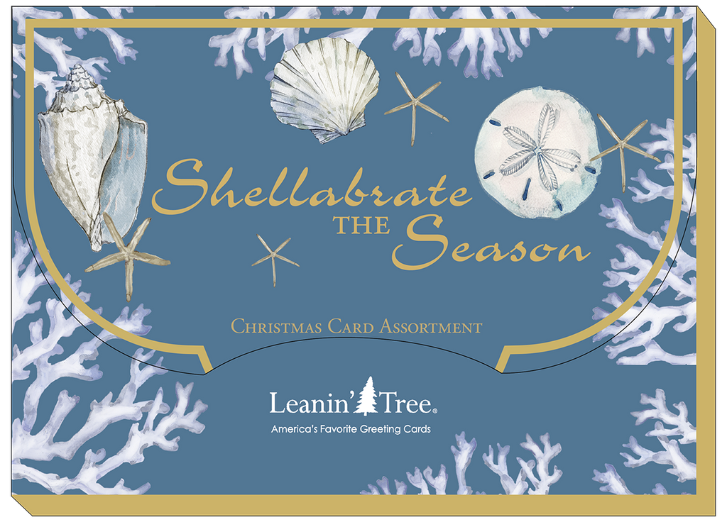 Retail packaging for coastal holiday greeting card assortment, blue with white coral and seashells, text 'Shellabrate The Season'.