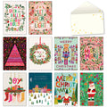Assortment of 10 vibrant holiday greeting cards and a decorative envelope featuring diverse festive designs like Santa, nutcrackers, wreaths, and carols.