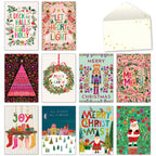 Assortment of 10 vibrant holiday greeting cards and a decorative envelope featuring diverse festive designs like Santa, nutcrackers, wreaths, and carols.
