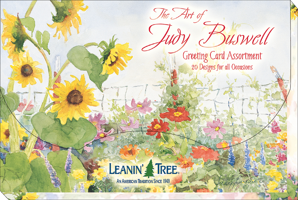 Leanin' Tree 'The Art of Judy Buswell' greeting card assortment box, showcasing vibrant watercolor sunflowers and a charming garden landscape.