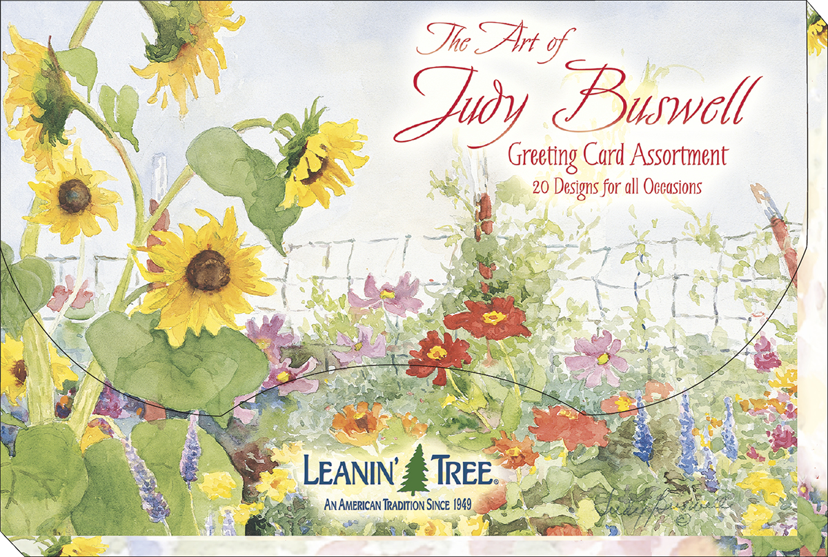 Leanin' Tree 'The Art of Judy Buswell' greeting card assortment box, showcasing vibrant watercolor sunflowers and a charming garden landscape.