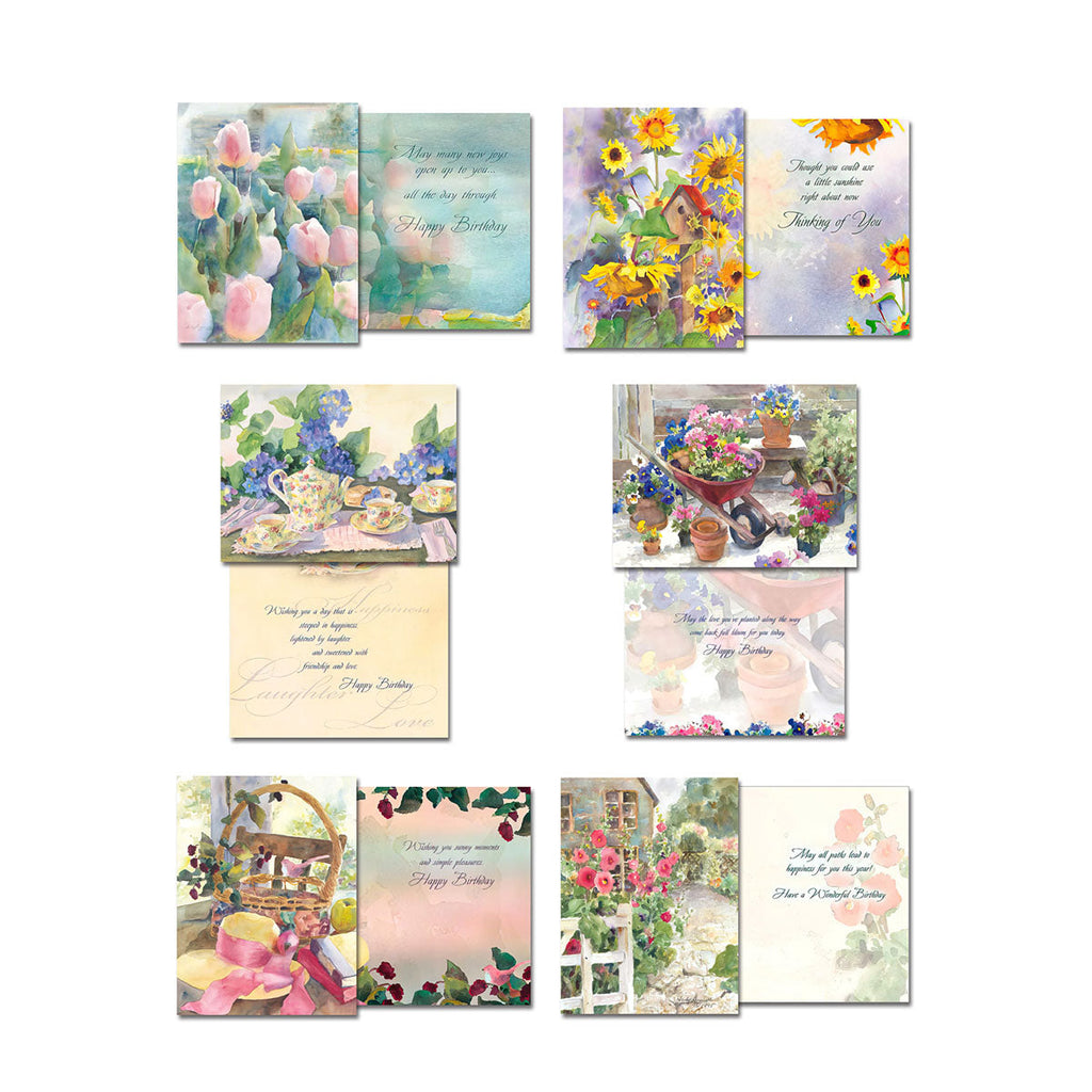 Selection of open watercolor floral greeting cards displaying various designs and heartfelt messages like 'Happy Birthday' and 'Thinking of You' for diverse occasions.