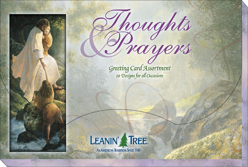 Front cover of the 'Thoughts & Prayers' Leanin' Tree greeting card assortment box, showing Jesus reaching out to a person by a stream, with elegant purple text and Leanin' Tree logo.