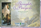 Front cover of the 'Thoughts & Prayers' Leanin' Tree greeting card assortment box, showing Jesus reaching out to a person by a stream, with elegant purple text and Leanin' Tree logo.