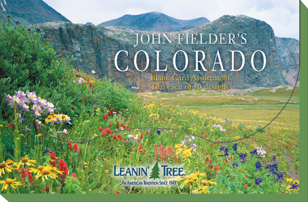 Front view of John Fielder's Colorado Blank Card Assortment box, featuring vibrant wildflowers in a mountain meadow with 'Leanin' Tree' logo.