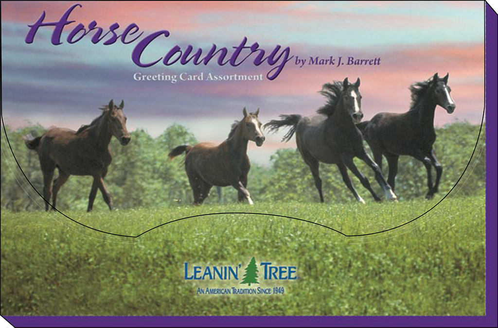 Front of the 'Horse Country' greeting card assortment box, featuring four dark horses gracefully running across a lush green field under a vibrant, colorful sky. 'Leanin' Tree' logo is visible at the bottom.