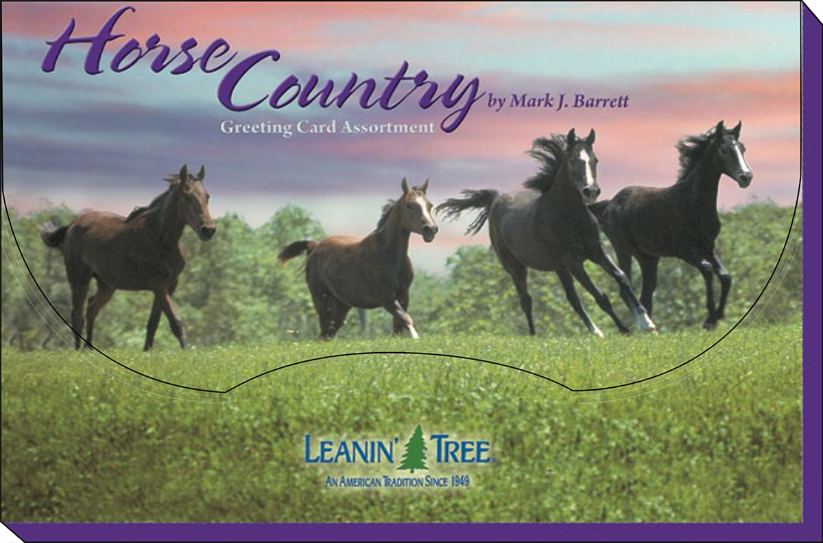 Front of the 'Horse Country' greeting card assortment box, featuring four dark horses gracefully running across a lush green field under a vibrant, colorful sky. 'Leanin' Tree' logo is visible at the bottom.