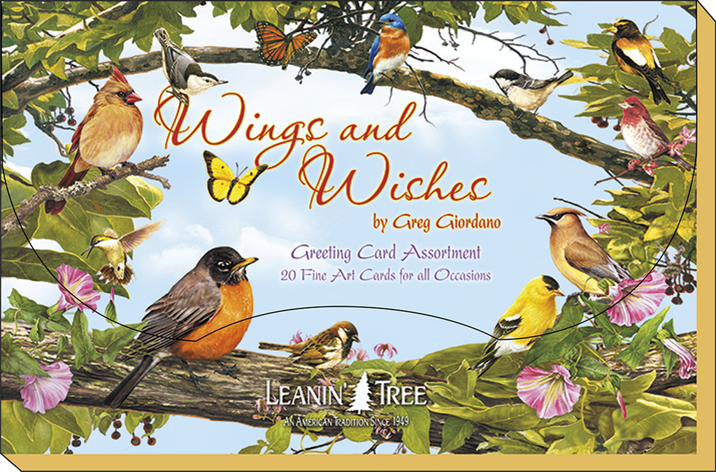 Close-up of 'Wings and Wishes by Greg Giordano' greeting card box lid, showing various colorful birds and butterflies on a branch.