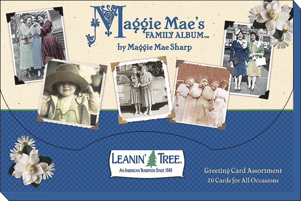 The 'Maggie Mae's Family Album' by Leanin' Tree greeting card assortment box, showcasing vintage photos and a blue plaid design with white flowers.