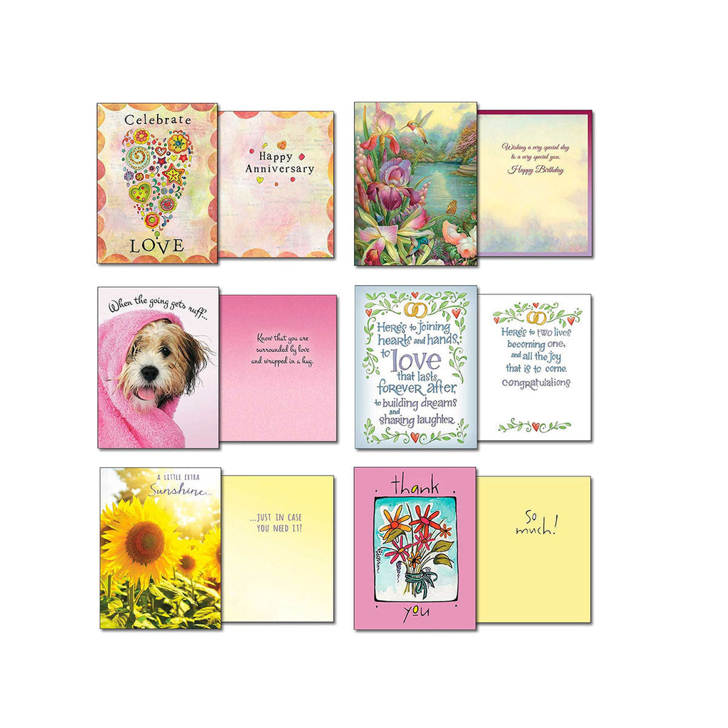 Assortment of Leanin' Tree greeting cards with messages like 'Celebrate Love', 'Happy Anniversary', 'When the going gets ruff', and 'Thank You', featuring vibrant artwork of flowers, hummingbirds, and cute dogs.