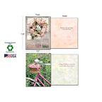 Close-up of a greeting card's front (floral wreath) and blank interior, displaying dimensions (5.5" x 7.25"), along with another card's front (pink bicycle) and its "Happy Birthday" message inside. Includes 'Sustainably-Sourced Paper' and 'Made in USA' labels.