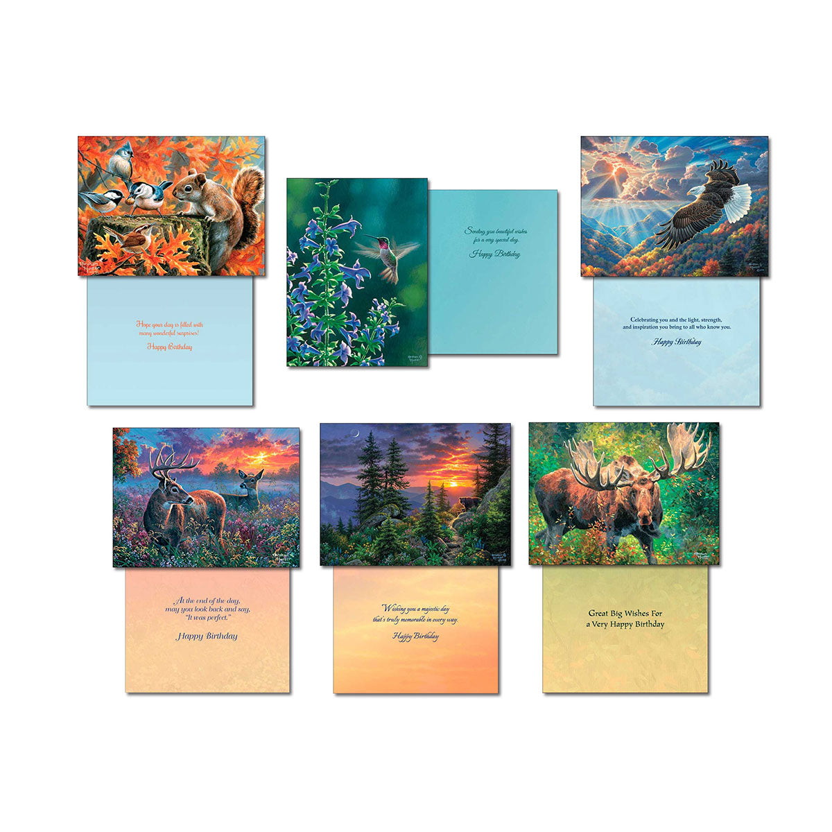 Variety pack of nine wildlife greeting cards with open insides showing 'Happy Birthday' messages, featuring squirrels, hummingbirds, eagle, deer, and moose in scenic landscapes.