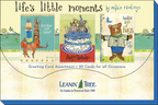 Packaging for 'Life's Little Moments' greeting card assortment, featuring three sample cards: a birthday llama, festive dogs/cats on a cake, and a bear sending hugs.