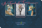 Dark blue packaging box for 'A Touch of Fancy by Heather Gauthier' greeting card assortment, featuring three framed animal art cards: a tiger, a zebra, and a giraffe, all adorned with flowers, with the 'Leanin' Tree' logo at the bottom.